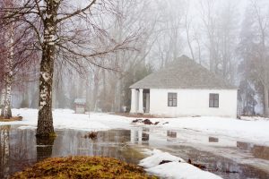 Relocate snow piles to minimize water from seeping through your basement foundation walls and causing water damage to your basement or crawlspace | Water damage restoration services by McMahon Services and Construction of Chicago, Arlington Heights, Berwyn, Des Plaines, Evanston, Grayslake, Mundelein, Libertyville, and Skokie, IL