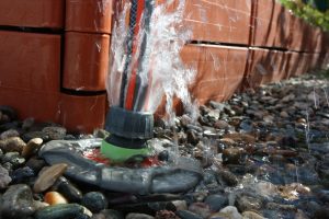 Sprinklers and hoses can cause basement water damage and basement flooding to your home | Water damage restoration Chicago Services by McMahon Services and Construction of Chicago, Arlington Heights, Berwyn, Des Plaines, Evanston, Grayslake, Mundelein, Libertyville, and Skokie, IL