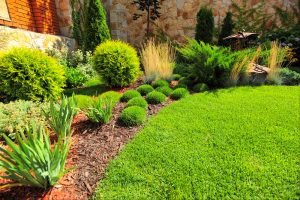 Grading, mulch, and landscaping your lawn can help prevent basement flooding | Water damage restoration Chicago Services by McMahon Services and Construction of Chicago, Arlington Heights, Berwyn, Des Plaines, Evanston, Grayslake, Mundelein, Libertyville, and Skokie, IL