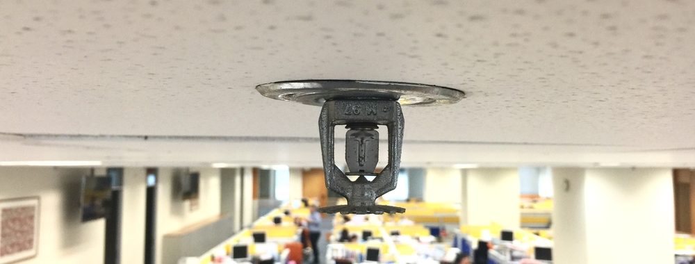 Water damage caused by commercial sprinkler systems | Water damage restoration services by McMahon Services and Construction of Chicago, Arlington Heights, Berwyn, Des Plaines, Evanston, Grayslake, Mundelein, Libertyville, and Skokie, IL